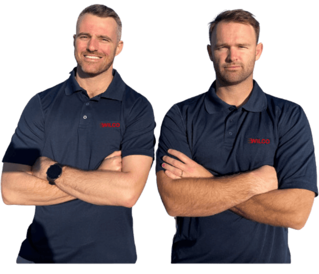 two guys smiling
